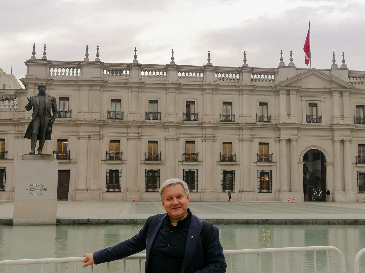 Dr Marcin Turski in front of the La Moneda Presidential Palace in Santiago