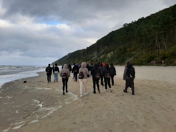 Photo of students on the beach 