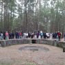 A group of students at the entrance to an underground bunker