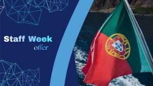 he Portuguese flag flies from a boat against a bright blue sky, with the ocean and rocky coastline in the background. On the left side, a dark blue panel displays the words “Staff Week offer” in gradient blue‑white text with geometric line patterns.